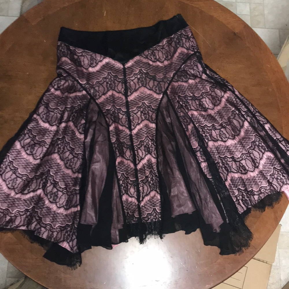 Pink satin with black lace overlay skirt.